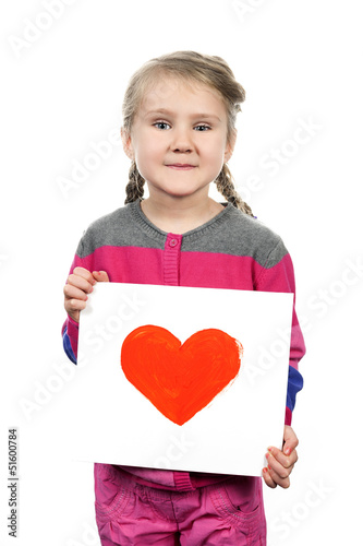 Photo: Drawn heart in girl hands Drawn heart in girl hands