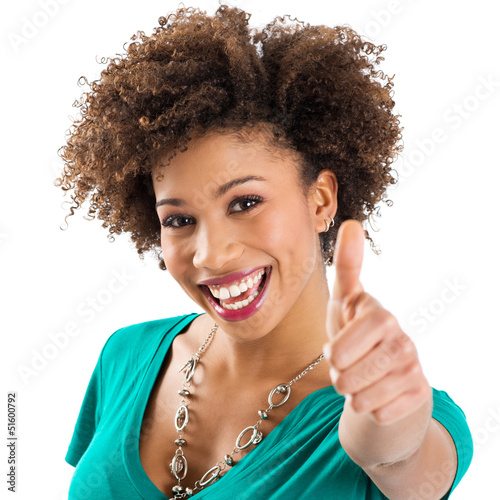 Photo: Portrait Of Young Woman Showing Thumb Up Sign Portrait Of Young Woman Showing Thumb Up Sign