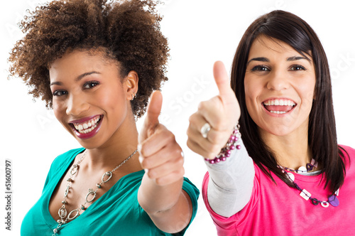 Photo: Two Friends Showing Thumb Up Sign Two Friends Showing Thumb Up Sign