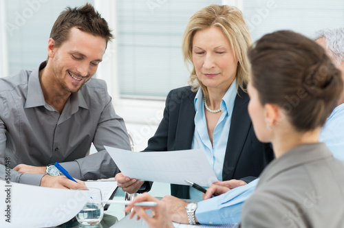 Photo: Happy Business People In Meeting Happy Business People In Meeting
