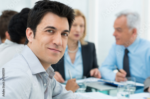 Photo: Portrait Of Young Businessman Portrait Of Young Businessman