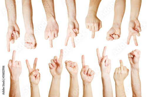 Photo: Viele Hände zeigen verschiedene Symbole Viele Hände zeigen verschiedene Symbole