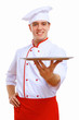 Photo: Cook holding an empty tray Cook holding an empty tray