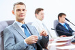 Three businesspeople at meeting