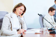 Three businesspeople at meeting