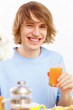 Young man drinking juice