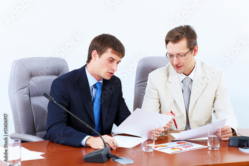 Photo: Two businessmen at meeting Two businessmen at meeting