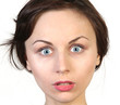 Surprised woman face over white
