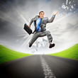 Businessman running on the road