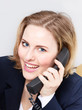 Female office assistant has a call at the office