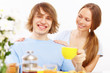 Couple at home drinking tea