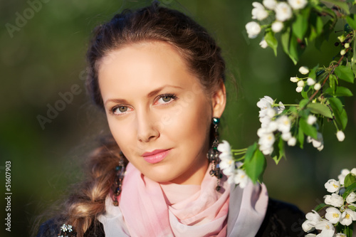 Photo: Beautiful woman in a spring garden Beautiful woman in a spring garden