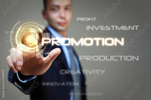 Photo: Business man touching display Business man touching display