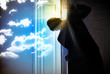Young businessman opening door