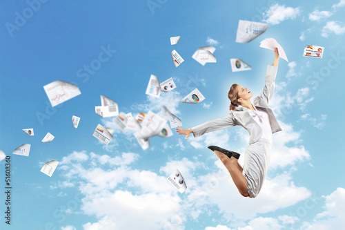Photo: Image of jumping businesswoman Image of jumping businesswoman