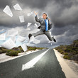 Businessman running on the road
