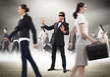Businessman in blindfold among group of people