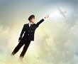 Image of pilot touching air