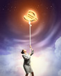 Image of businesswoman climbing the rope