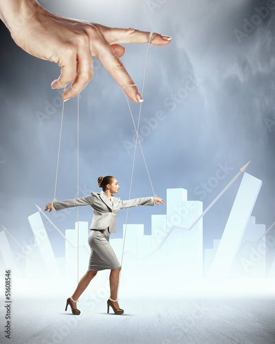 Photo: Business woman marionette Business woman marionette