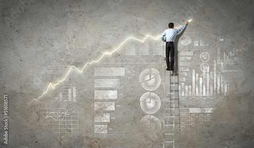 Photo: businessman drawing diagram businessman drawing diagram