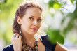 Beautiful woman in a spring garden