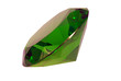 Green emerald gemstone on white background, lateral view
