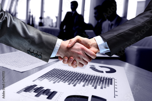 Photo: The businessman. Hand for a handshake. The businessman. Hand for a handshake.