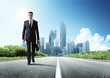 Foto: business man walking on the road business man walking on the road