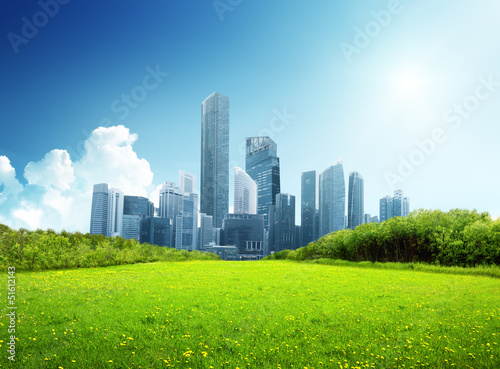 Photo: spring park and modern city spring park and modern city