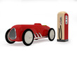 Retro toy car and  gas station