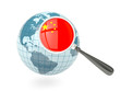 Illustration: Magnified flag of china with blue globe Magnified flag of china with blue globe