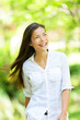 Joyful woman in a spring or summer park