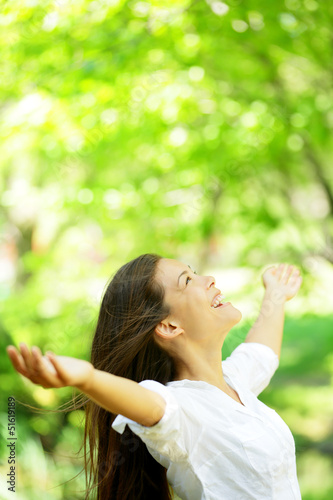 Photo: Happy woman rejoice looking up happy Happy woman rejoice looking up happy