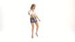 sexy young girl dancing against white background