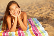 Beautiful woman sunbathing on the beach