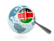 Illustration: Magnified flag of kenya with blue globe Magnified flag of kenya with blue globe