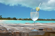 Glass of water against ocean