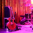 Guitar and other musical equipment on stage before concert