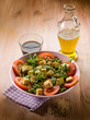 salad with tofu tomatoes arugula and sesame seeds