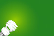 Compact Fluorescent Bulb on green background