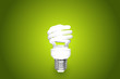 Compact Fluorescent Bulb on green background
