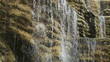 Stream water falling down the rock.