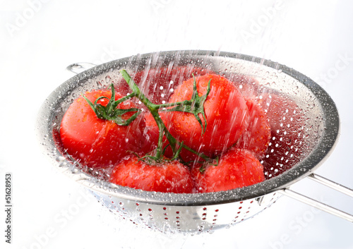 Photo: Tomatoes-on-vine-water-splash Tomatoes-on-vine-water-splash