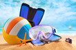 Plastic beach ball with goggles and flippers