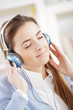 young woman enjoying music