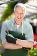 Smiling male florist
