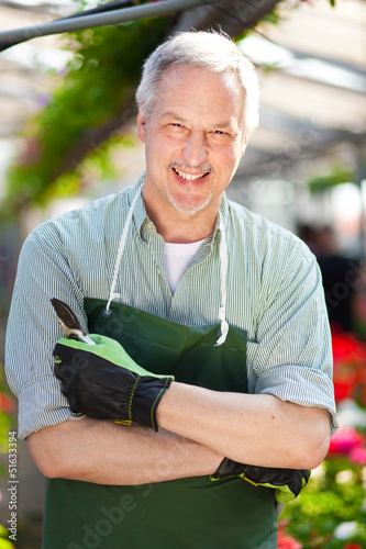 Photo: Smiling male florist Smiling male florist