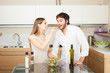 Photo: Woman spicing a salad Woman spicing a salad