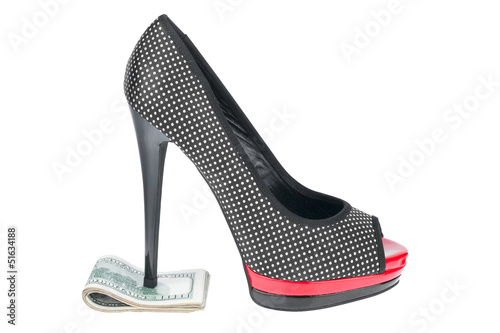 Photo: Women's shoes stand on the money Women's shoes stand on the money